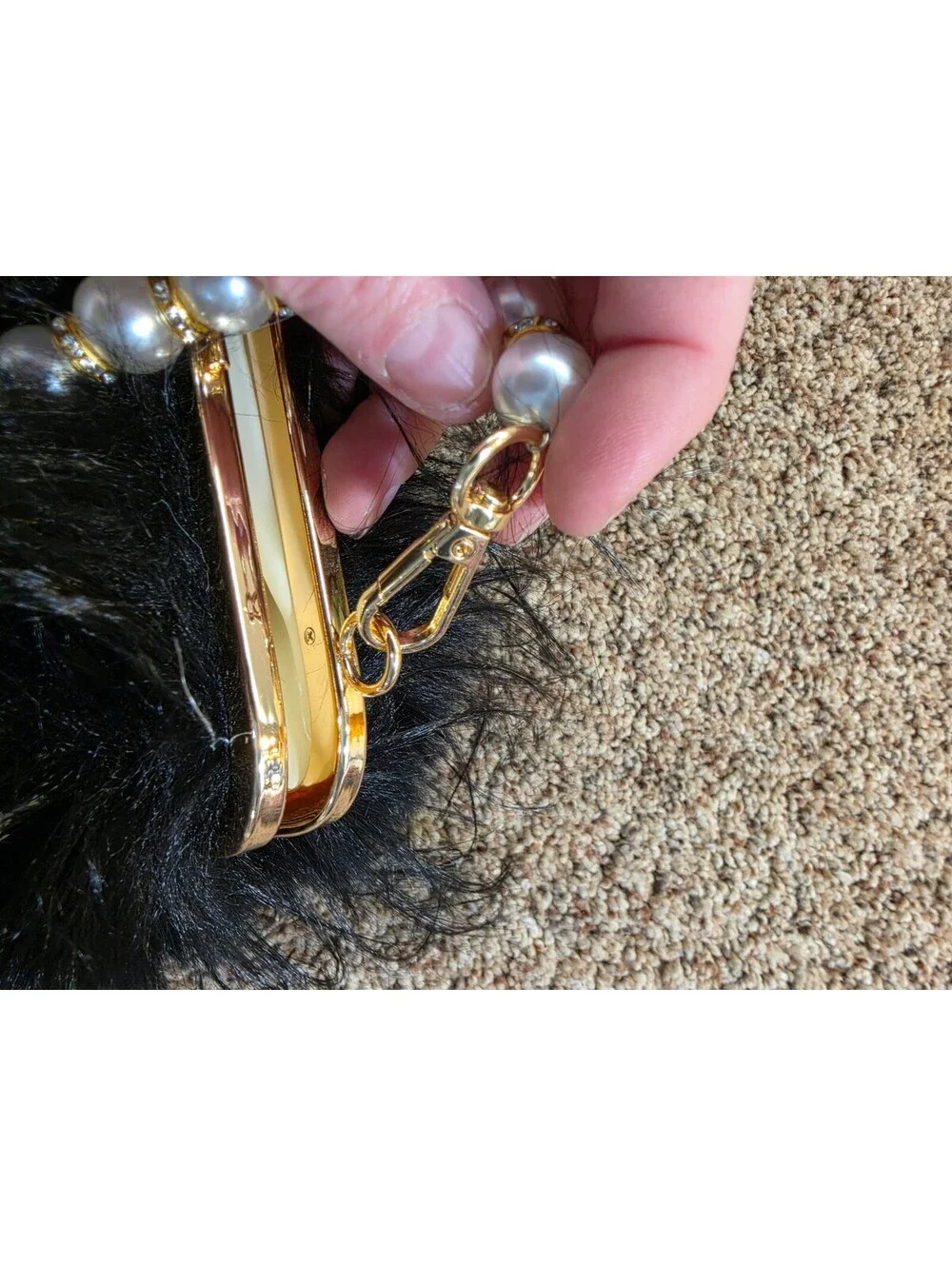 Elegant Black Faux Fur Clutch Bag with Pearl Handle and Gold Frame